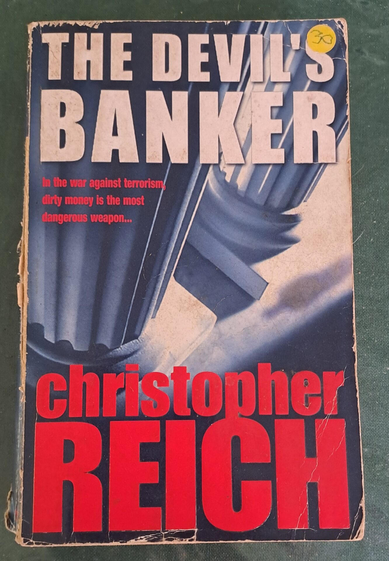 20260308_092301 The Devil’s Banker – Christopher Reich secondhand book